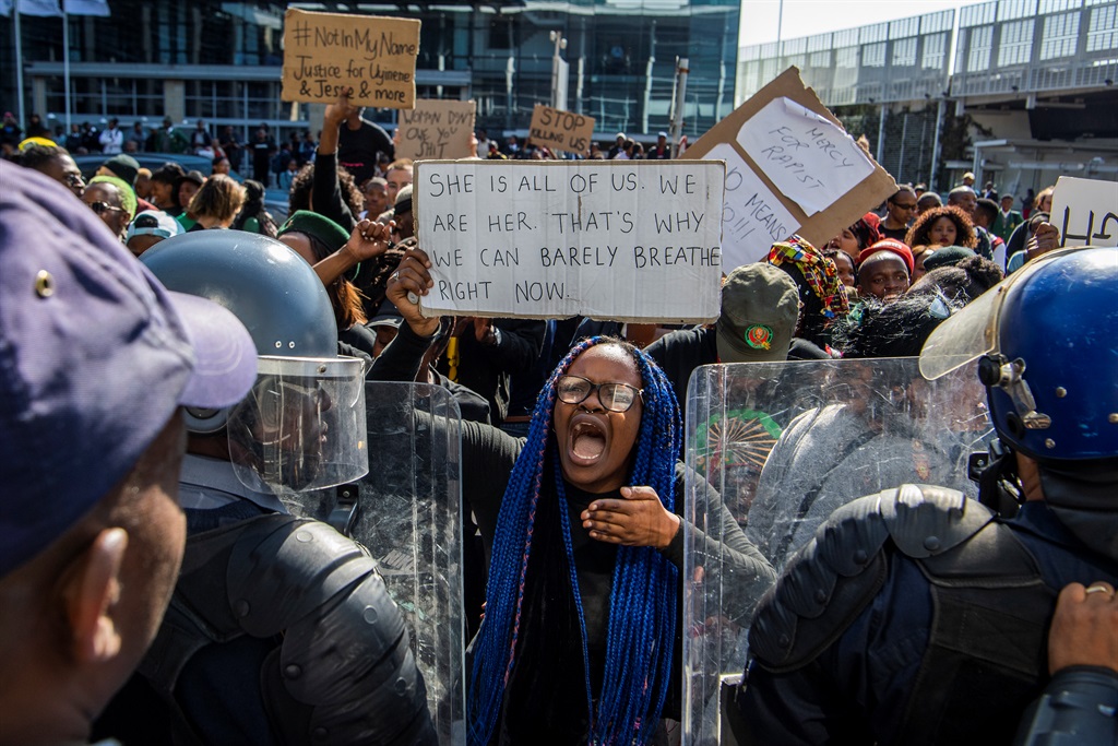 Students clash with police as they try to storm the Cape Town International Convention Centre following the rape and murder of 19-year-old University of Cape Town student Uyinene Mrwetyana in 2019.