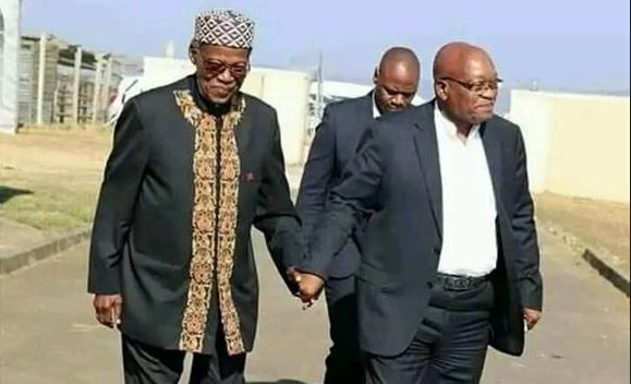 Jacob Zuma holding hands with the late Prince Mangosuthu Buthelezi. 