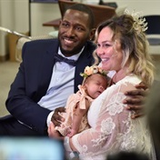 Their baby girl was born at just 28 weeks – so this couple decided to marry in her neonatal ICU so she could be part of their big day