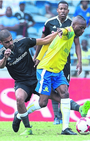 Abbubaker Mobara (left) of Pirates and Khama Billiat of Sundowns battle for the ball during their league game yesterday. Photo by Trevor Kunene