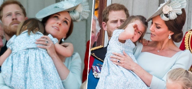 Duchess Catherine comforts Princess Charlotte. (Photo: Getty Images)