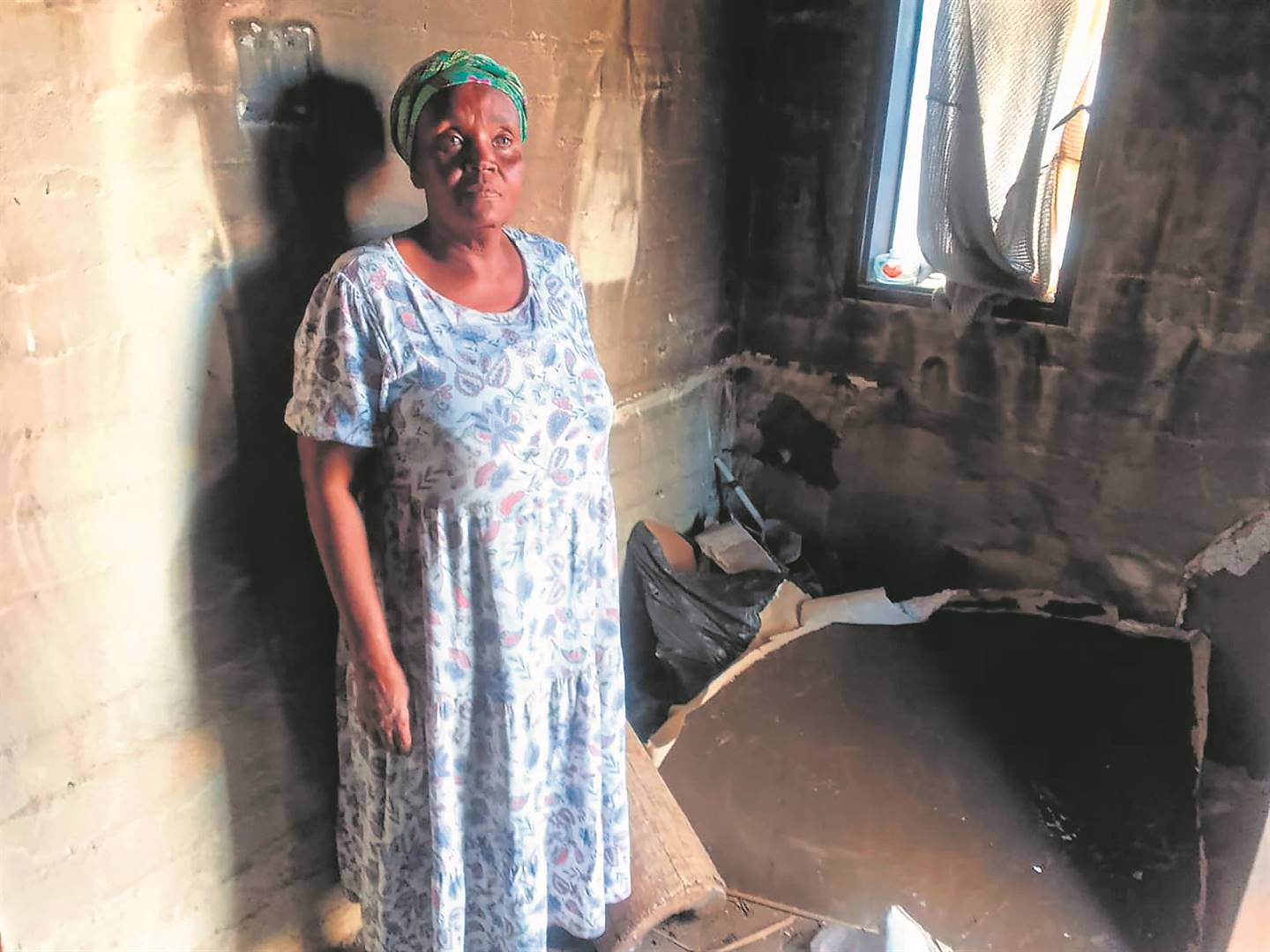 Gogo Basetsana Ndala said her house was burnt after her granddaughter fought with her neighbour’s daughter.  Photo by Raymond Morare