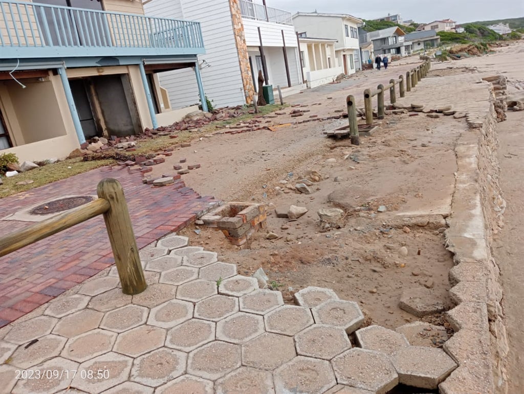 Damaged paving and infrastructure on beachfront pr