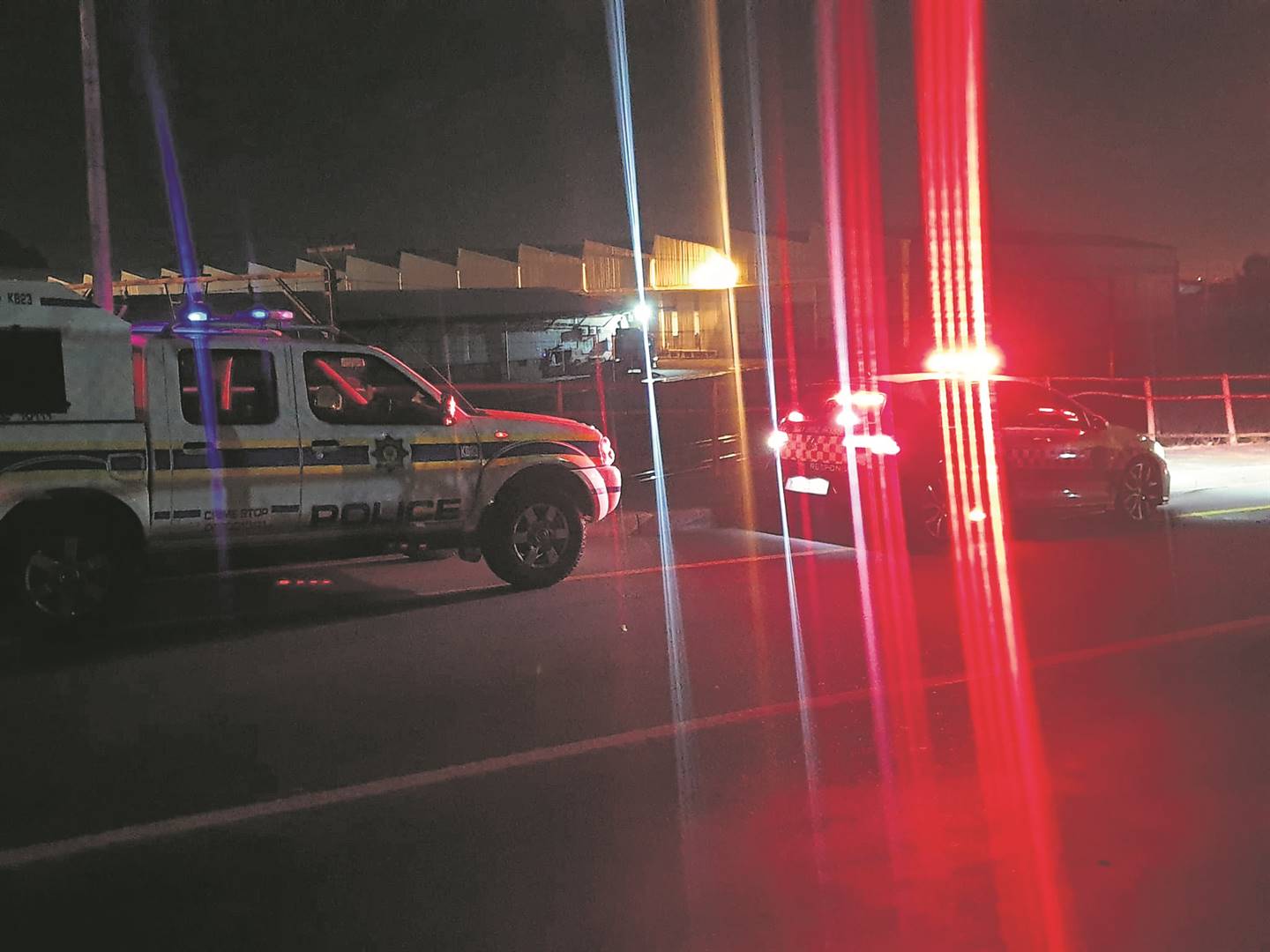 Police and members of a security company at the scene in Brackenfell over the weekend. 