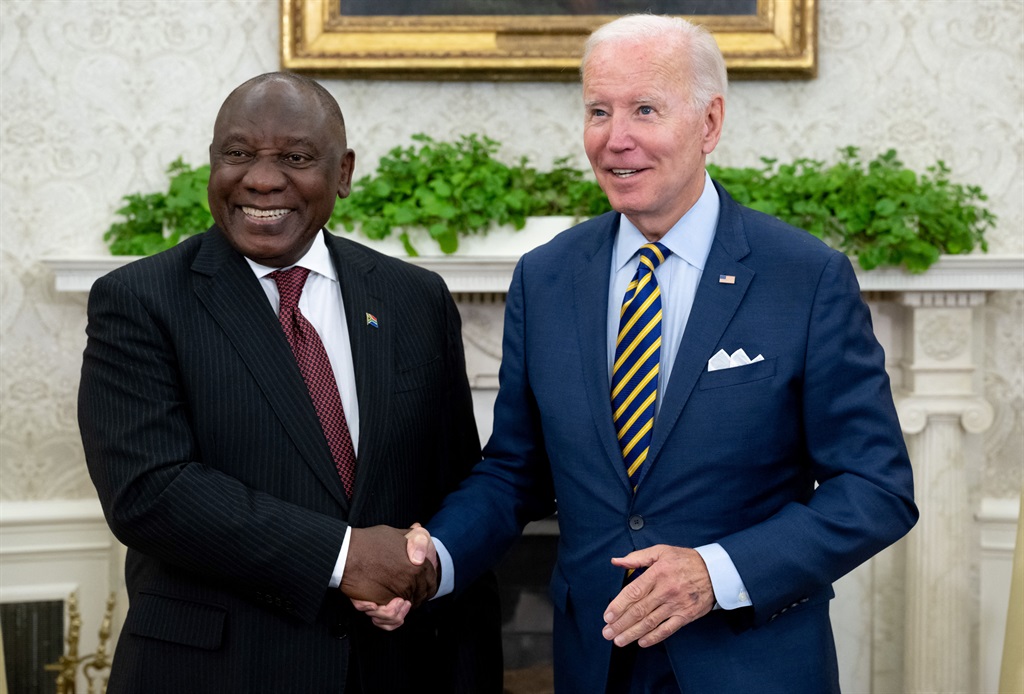 US President Joe Biden shakes hands with President Cyril Ramaphosa in the Oval Office of the White House.