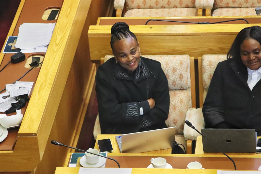Public Protector Busisiwe Mkhwebane enjoying a lighter moment during Wednesday's hearings on her impeachment. 