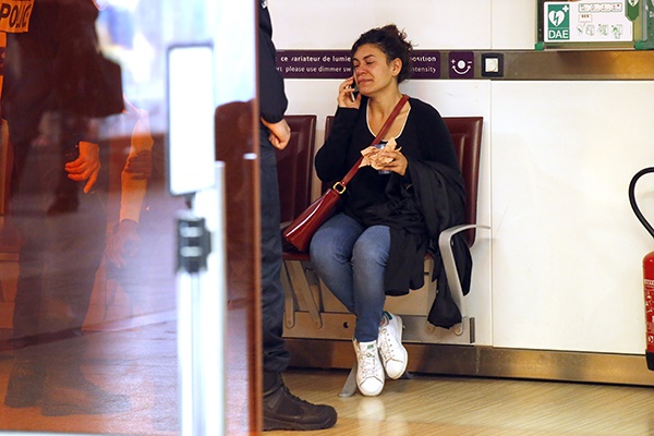 A relative of the victims of the EgyptAir
flight 804 that crashed, reacts as she makes a phone call at Charles de Gaulle
Airport outside of Paris (Michel Euler, AP)

