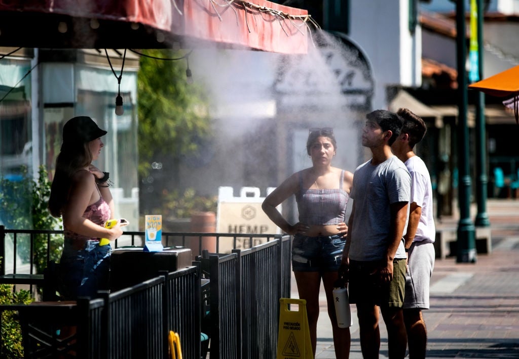 Customers cool off at a downtown restaurant in Palm Springs, California. 