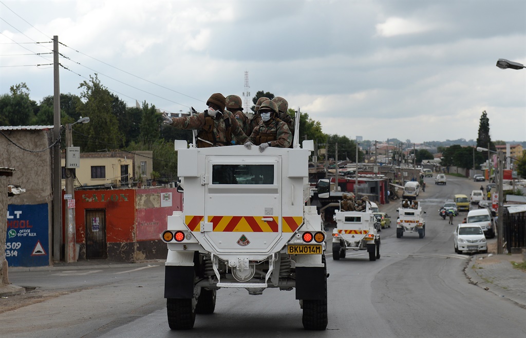 The army raided the Madala hostel in Alexandra with the police. People in Alexandra were going about their business and was urged to stay home and abide the lockdown rules. 