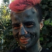  Call me Mutant Man! This tattoo fanatic has more than 13 facial piercings and keeps leftover slices of his ear in a jar