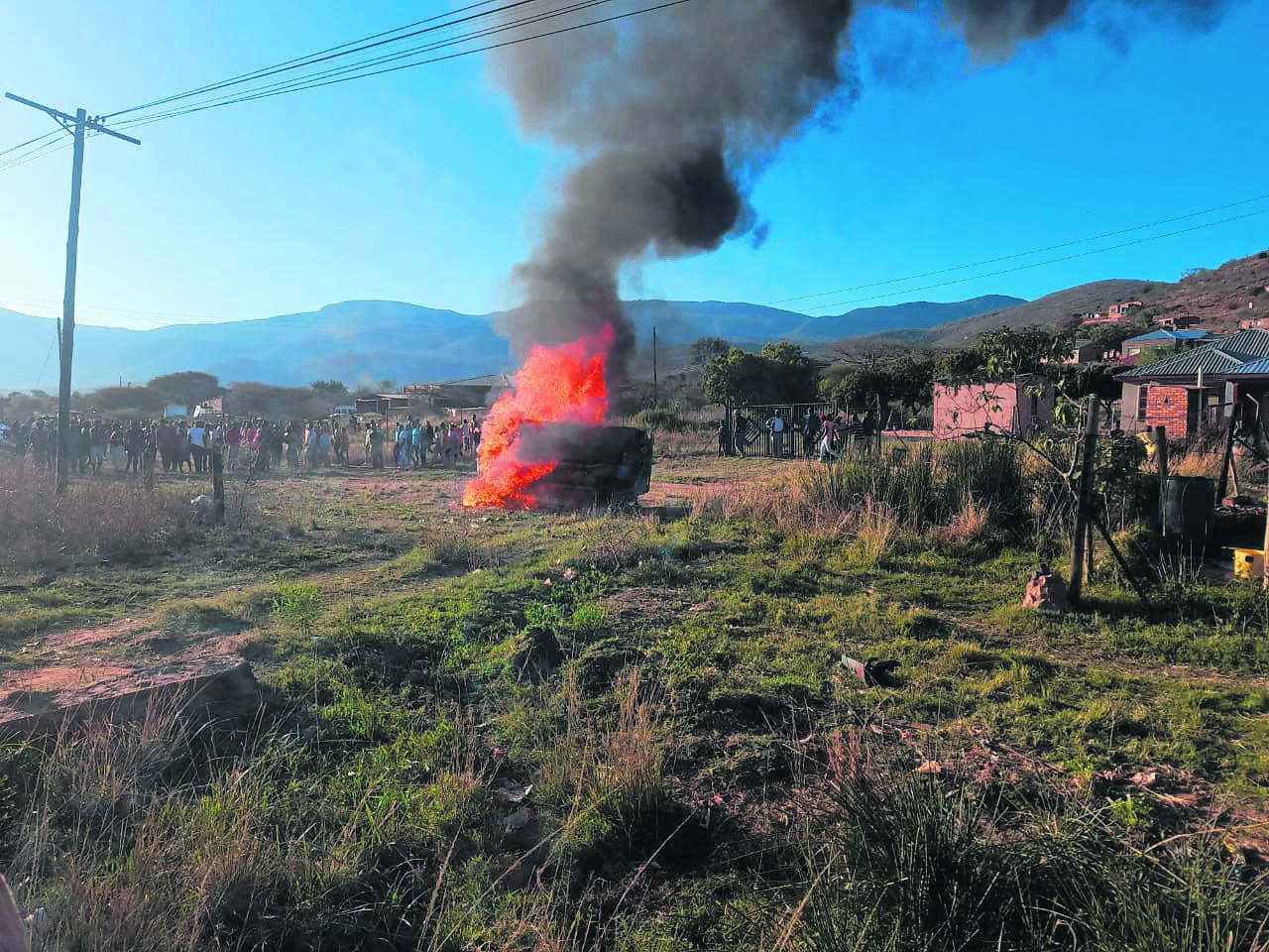 Villagers stoned two robbery suspects to death, setting them and their car alight in Tshavhalovhedzi Village outside Thohoyandou, Limpopo, on Wednesday. 