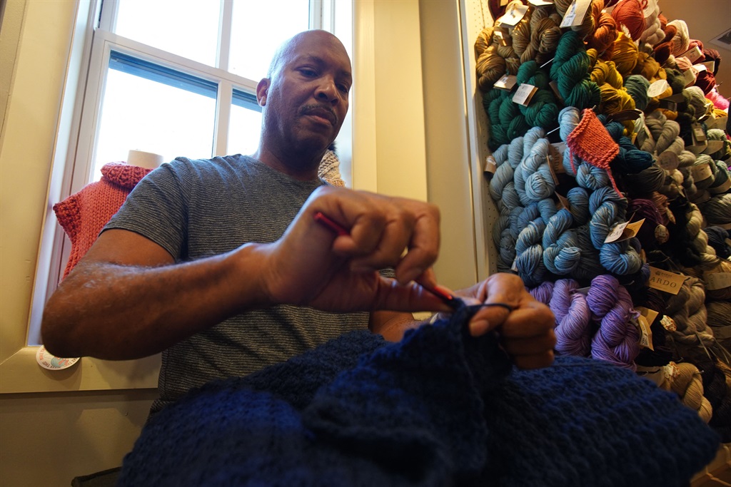 Michael Manning, a retired federal government worker, attends a gathering of DC Men Knit in Alexandria, Virginia, on March 5, 2023.