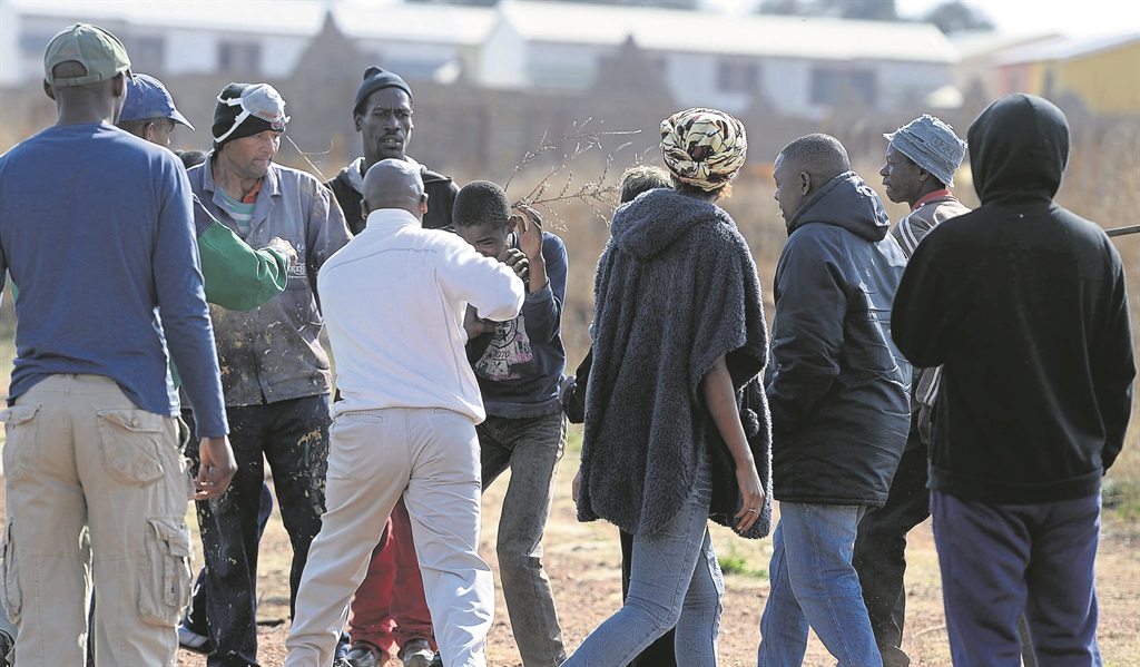 Eldorado Park residents came to the SunTeam’s help to rescue a schoolgirl from her would-be rapist and wanted to teach him a lesson. Photo by Trevor Kunene  
