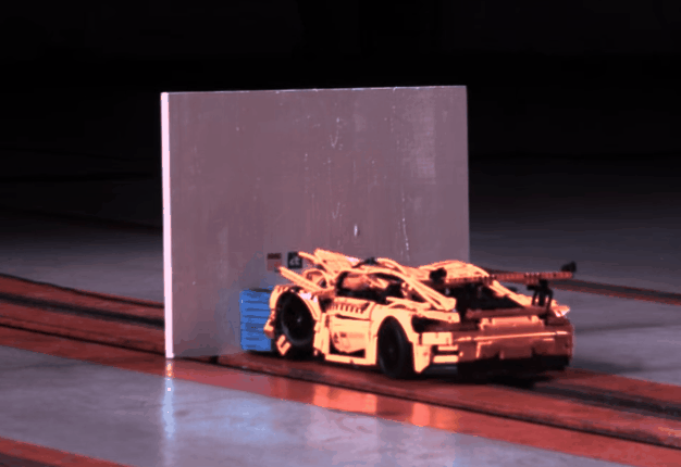 <b> NOT YOUR TYPICAL CRASH TEST: </b> High-speed cameras filmed a crash test conducted with a Lego Porsche 911 GT3. <i> Image: YouTube </i>