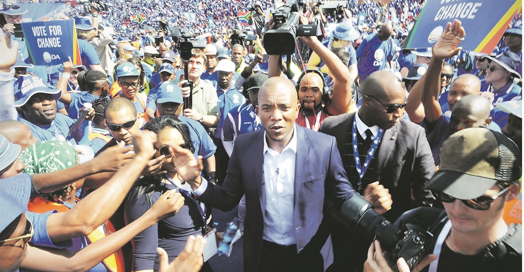 THE BLUE WAVE DA leader Mmusi Maimane moves through an adoring crowd during the party’s manifesto launch at the Rand Stadium.  Picture: Leon Sadiki  