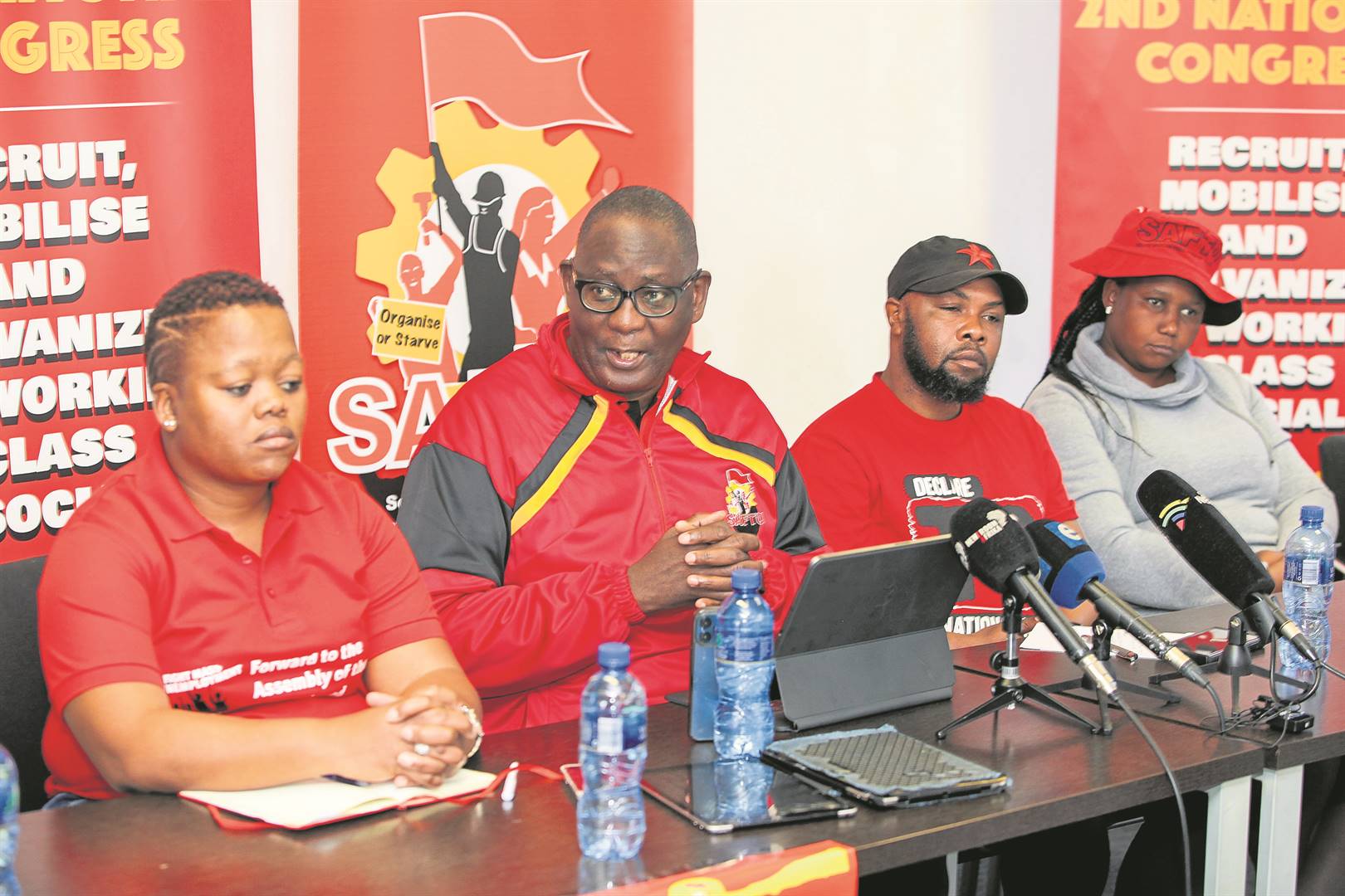 Zwelinzima Vavi (second from left) and Saftu leaders addressed the media yesterday about the final preparations for the planned national shutdown on 24 August.                                                    Photo by Gallo Images/Papi Morake
