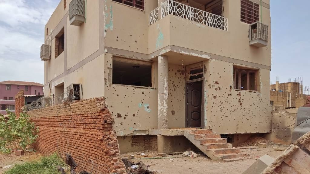 This picture shows a damaged house that was hit by