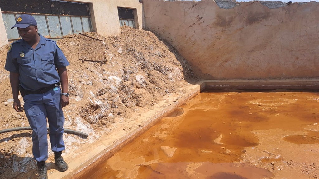 14 illegal miners were found busy processing gold-bearing material with heavy-duty machinery. Photo: Supplied