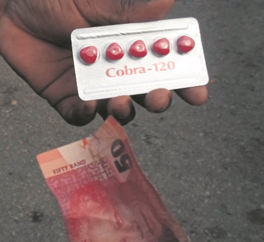 A client in Uitenhage pays R50 for tablets that usually sell for R20 on the streets.    Photo by      Joseph     Chirume 