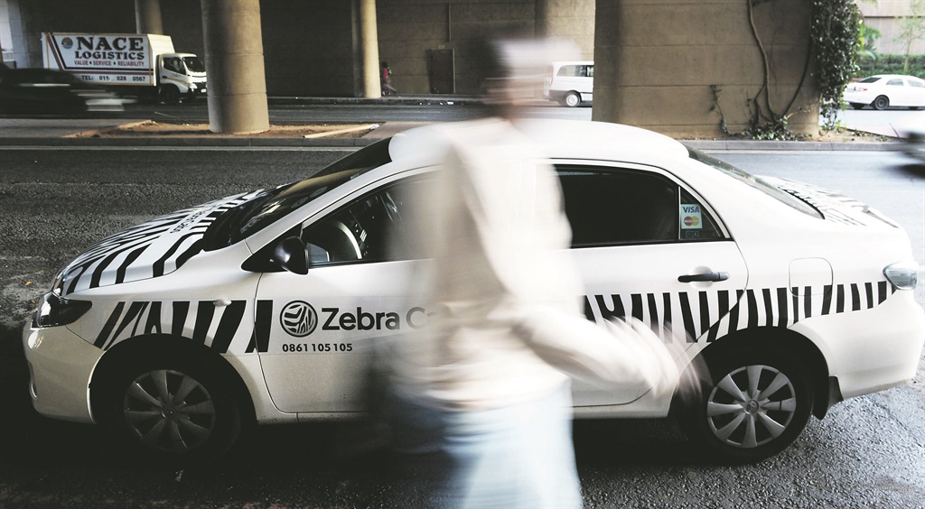 SA Taxi, which bought Zebra Cabs last year, says it hasn't been affected by Uber's cut in price.  PHOTO: leon sadiki 