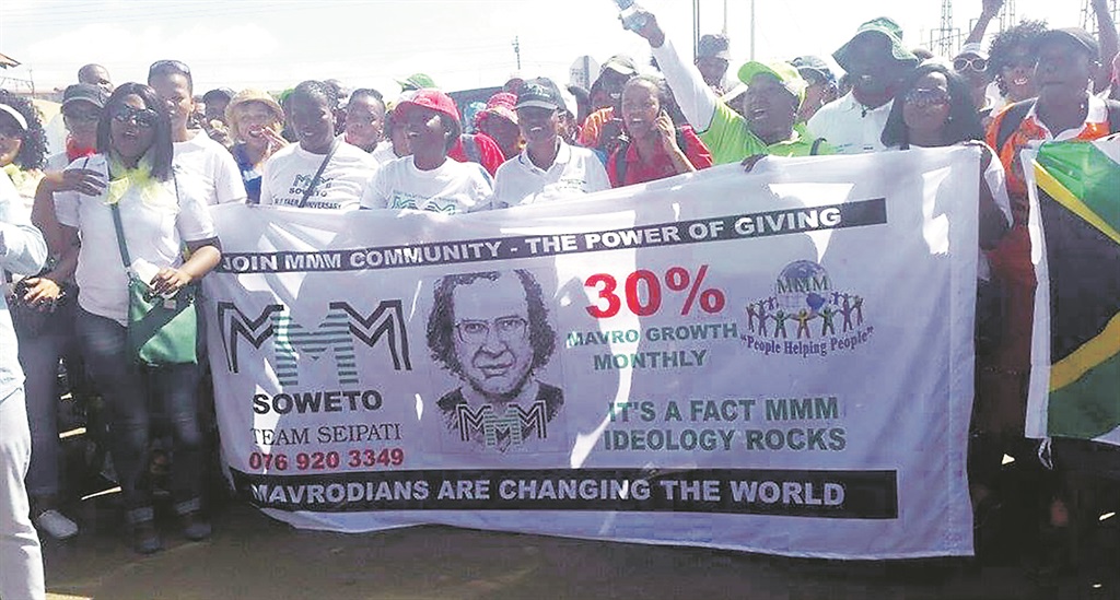 About 2 000 MMM members reiterated their support for the scheme and the money they had made by taking part in a financial freedom awareness march from Thokoza Park to Molapo in Soweto PHOTO: mavro news 