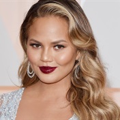 Yummy mummy Chrissy Teigen shows off her baby bump on family vacation