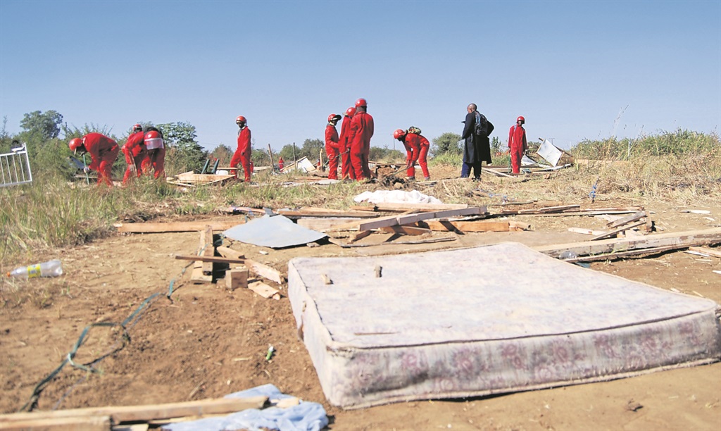For the seventh time, Red Ants destroyed shacks at Retshwenyegile but this time they took the corrugated iron away.                           Photo by Samson Ratswana 