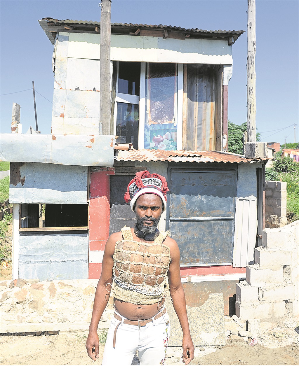 Sangoma Sikhumbuzo Kunene (46) built a double-storey shack for his ancestors in 2005.                         Photo by Jabulani Langa 