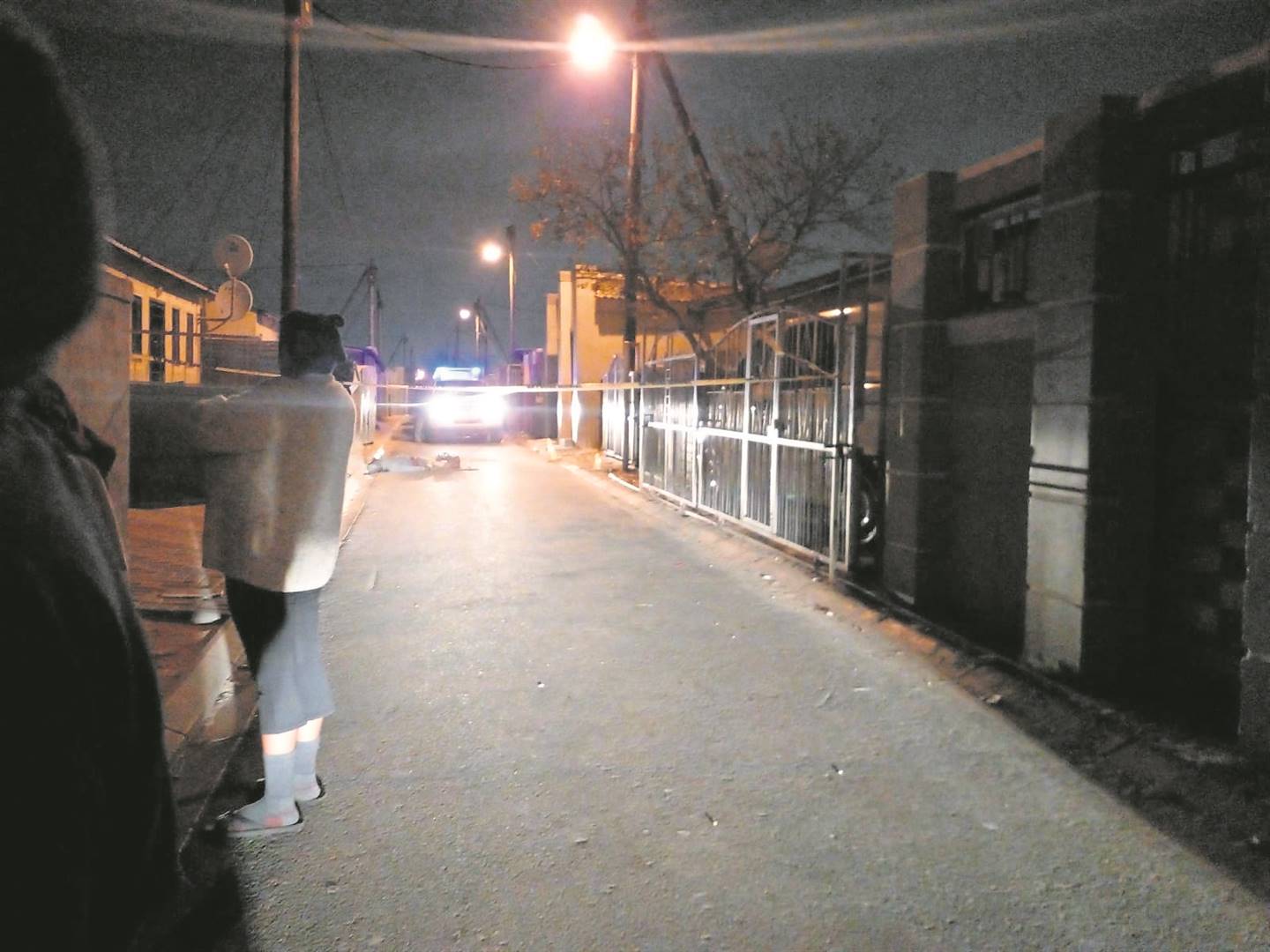 Residents are in shock after a man was shot dead in front of his house in N2 Gateway, Delft, on Wednesday night.  Photo by Lulekwa Mbadamane