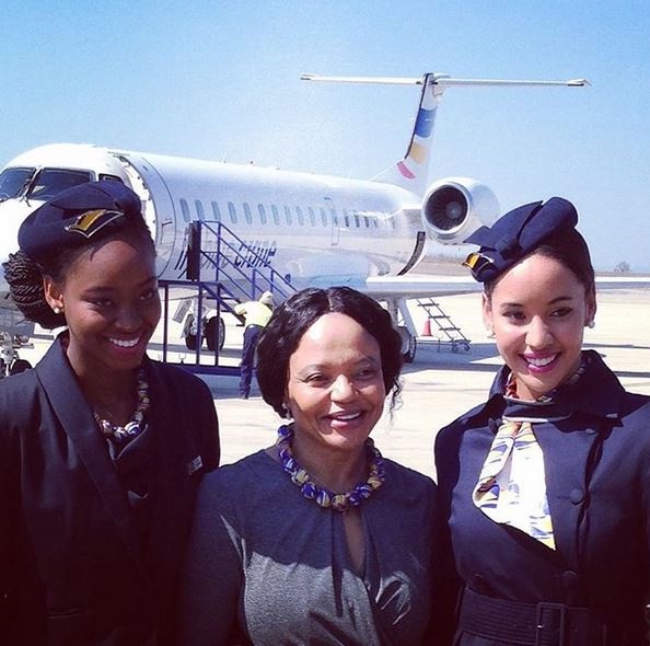 CEO Sizakele Mzimela with professional cabin crew. Photo from Instagram(@flybluecrane)