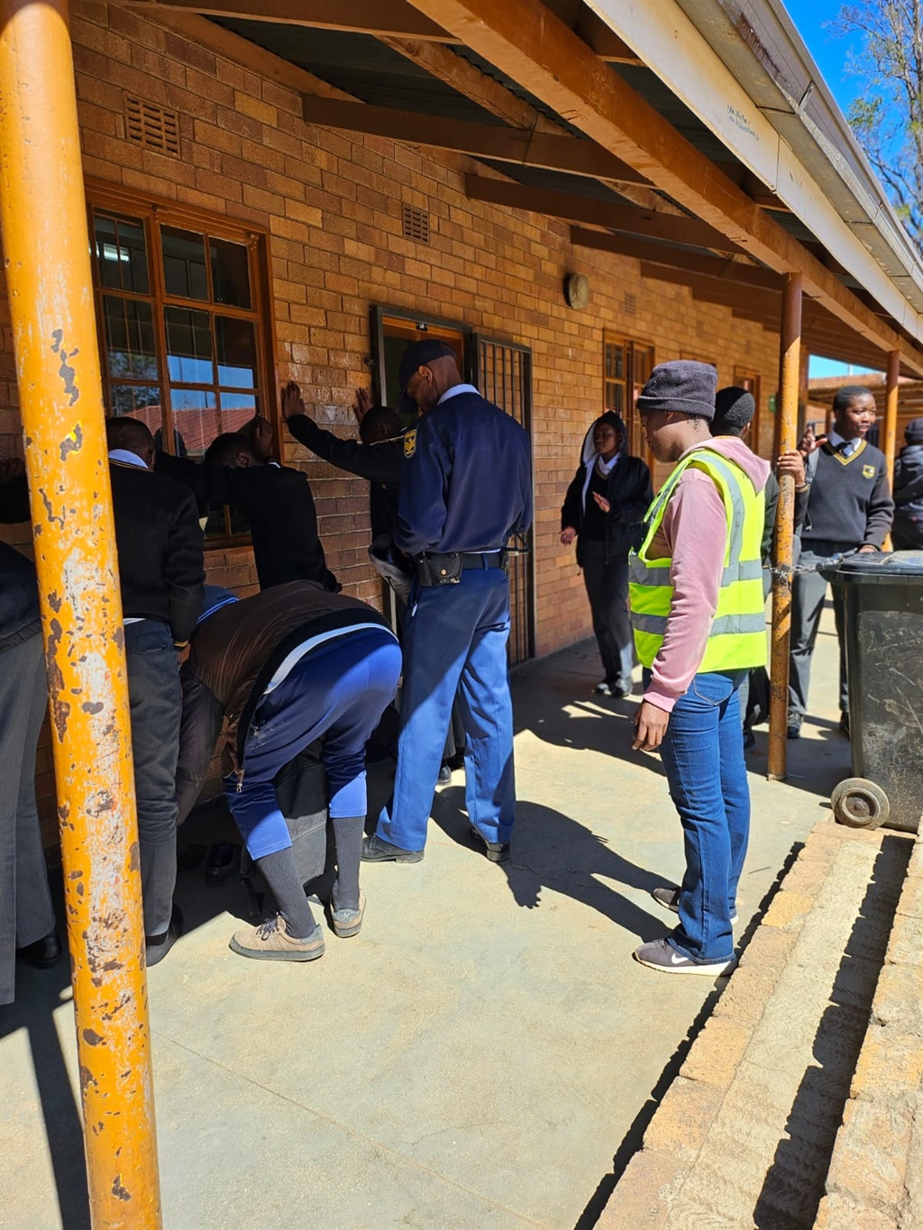 Police during the search at Lefa Ifa secondary school in KwaThema.