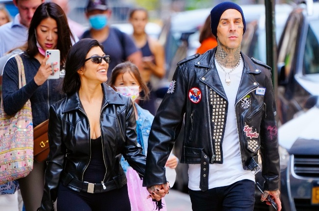 Fans have called Kourtney Kardashian and Travis Barker's PDA "embarrassing". (PHOTO: Getty Images) 