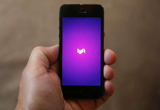 <b> AUTOMAKER INVESTS IN APP: </b>  As part of a $25-million investment into Lyft, Jaguar Land Rover has agreed to supply a fleet of vehicles to the e-hailing service. <i> Image: AP / Paul Sancya </i> 