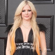 Pink dresses and a skull suitcase - Avril Lavigne launches fashion line