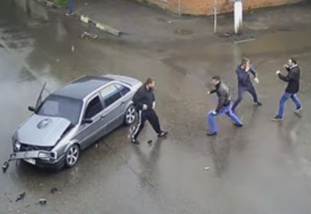 <B>NO FEAR AT ALL:</B> Russia is known for a lot of things and brawlers are one of them. It's amazing how a car crash can bring out the 'fighter' within... <I>Image: YouTube</I>
