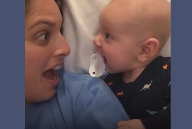 While recording herself and her baby during a little mommy and me time, this mom found that her little guy thought she was in two places at once. (Image: Youtube/Good Morning America)