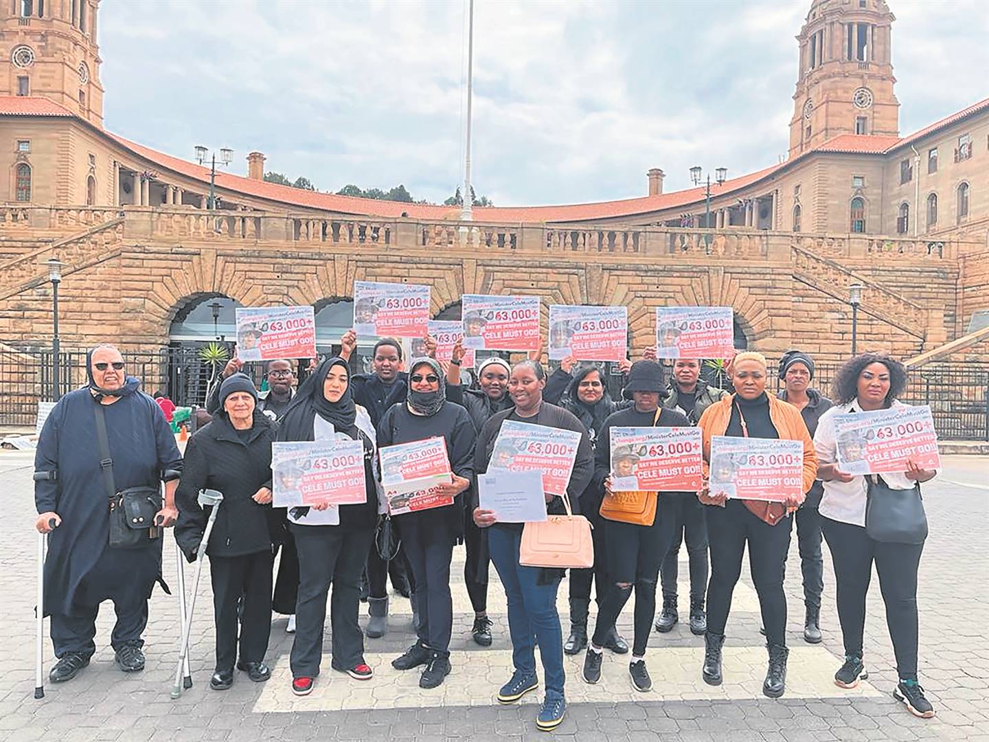National Shelter Movement of South Africa members, who’re calling for Minister Bheki Cele to be removed, delivered an open letter to the president’s office in Tshwane.      Photo by Raymond Morare