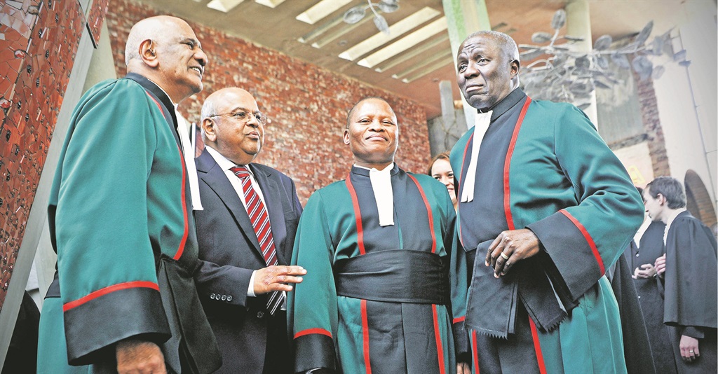 From left: Justice Zak Yacoob, Minister of Finance Pravin Gordhan, Chief Justice Mogoeng Mogoeng and Deputy Chief Justice Dikgang Moseneke at the Constitutional Court in Braamfontein in this file picture  PHOTO: Lerato Maduna 