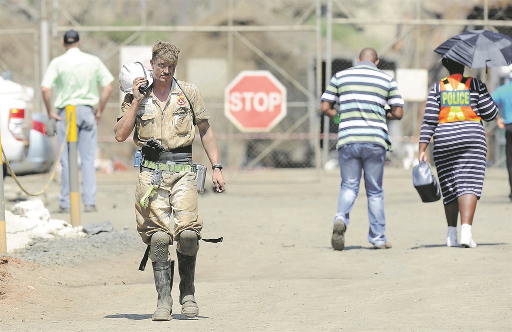 A member of a search-and-rescue team at Lily Gold Mine PHOTO: felix dlangamandla 