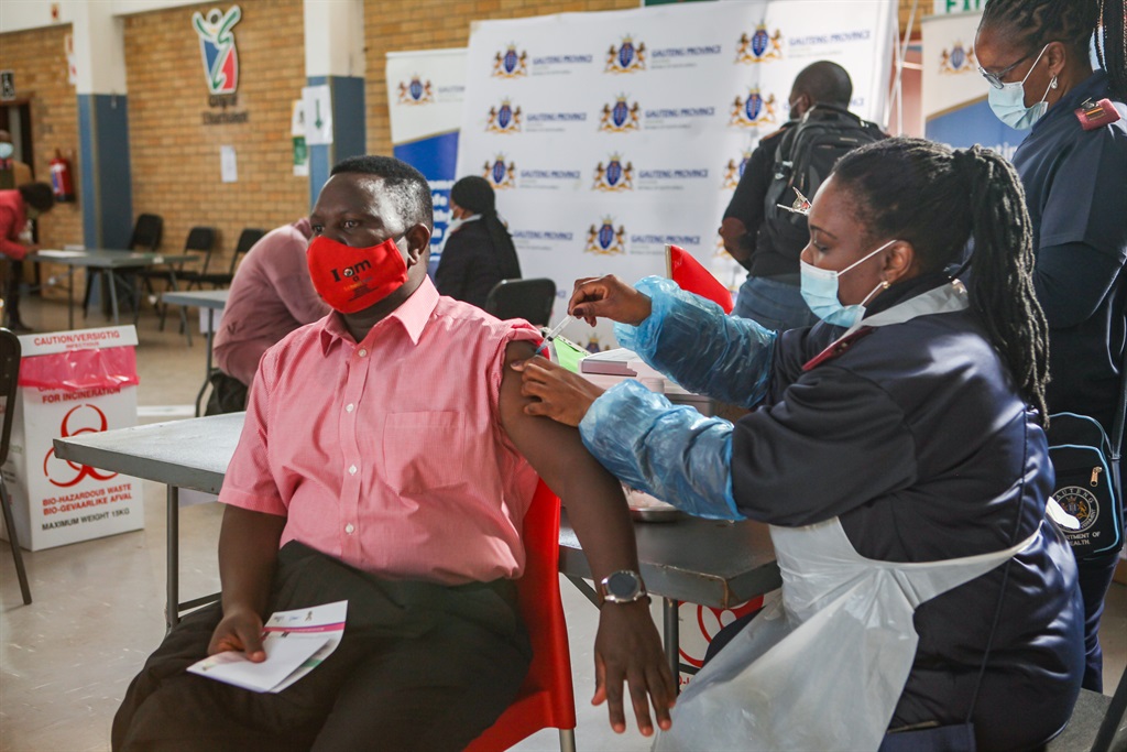 Teachers at the Rabasotho Community Hall vaccination site on 23 June 2021 in Tembisa.