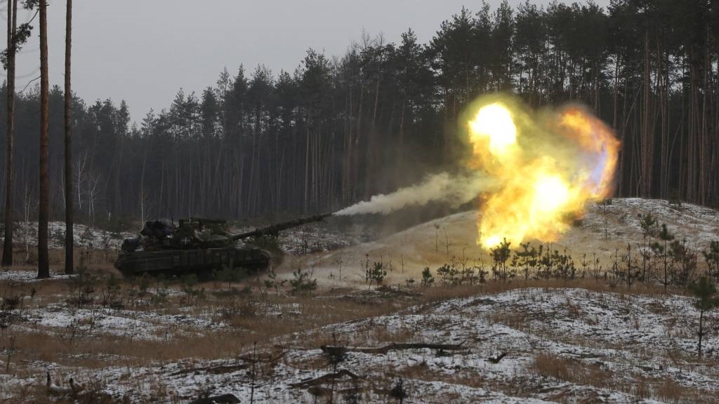 A Ukrainian tank fires at Russian positions near K