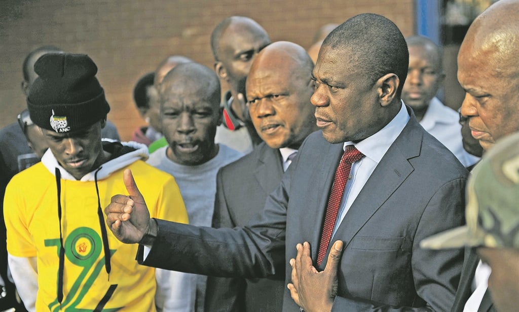 Gauteng Human Settlements MEC Paul Mashatile stopped an eviction process at an informal settlement in Hammanskraal this week after two men were killed PHOTO: TEBOGO LETSIE 