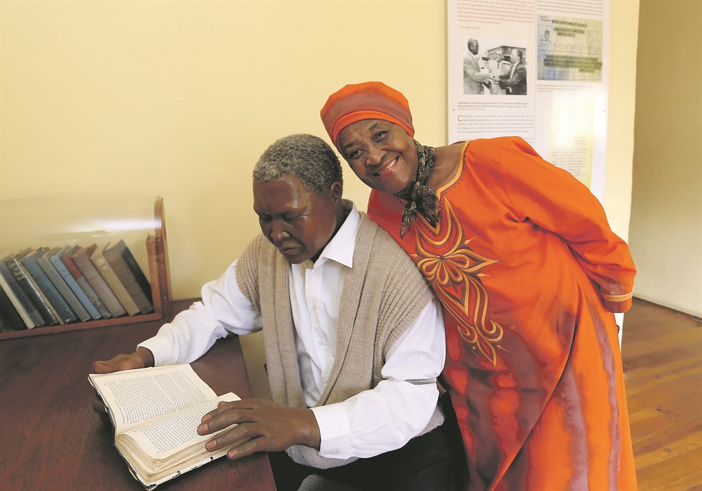 Dr Albertina Luthuli poses next to a statue of her ­father. Picture: Silverzone Images 