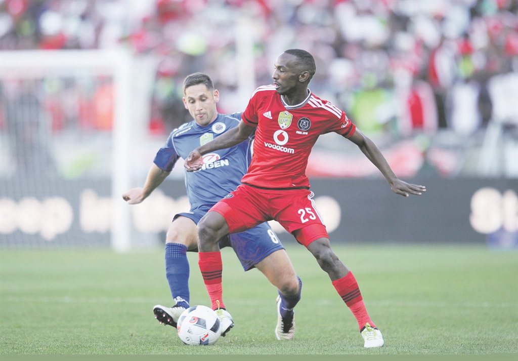 Dean Furman of SuperSport United challenges Thabo Rakhale of Orlando Pirates during the Nedbank Cup final between the two teams yesterday at Peter Mokaba Stadium  PHOTO: Sydney Mahlangu / BackpagePix 