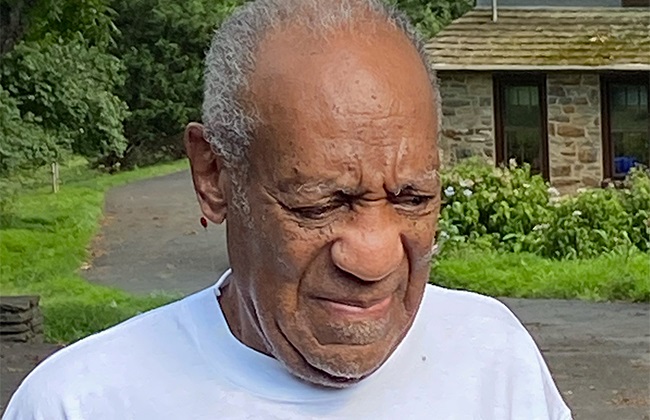 Bill Cosby speaks to reporters outside of his home on 30 June 2021 in Cheltenham, Pennsylvania. Bill Cosby was released from prison after the court overturned his sex assault conviction.