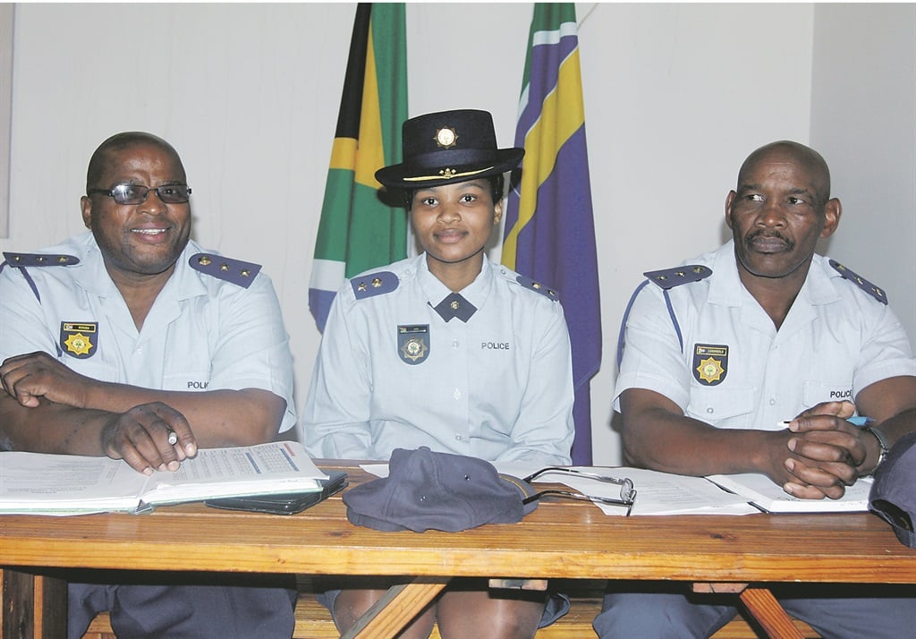 From left: Colonel Vakele Bekebu, Nontle Ndabeni and Colonel Alfred Lugongolo at the Cambridge Police Station.  Photo by Mbulelo Sisulu 