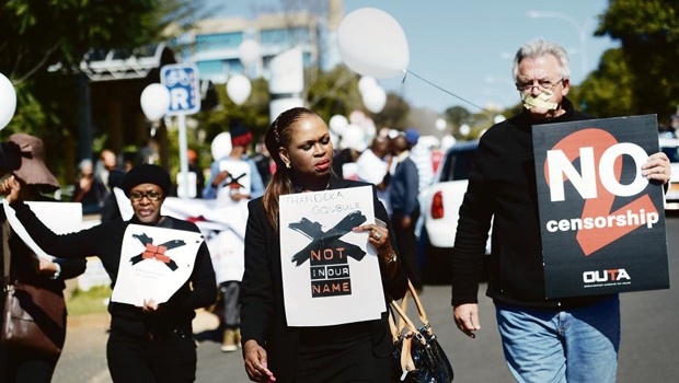 Suspended SABC employee Thandeka Gqubule and RSG presenter Cobus Bester lead the march against censorship to Constitutional Hill on Friday. Photo: Leon Sadiki/ City Press 