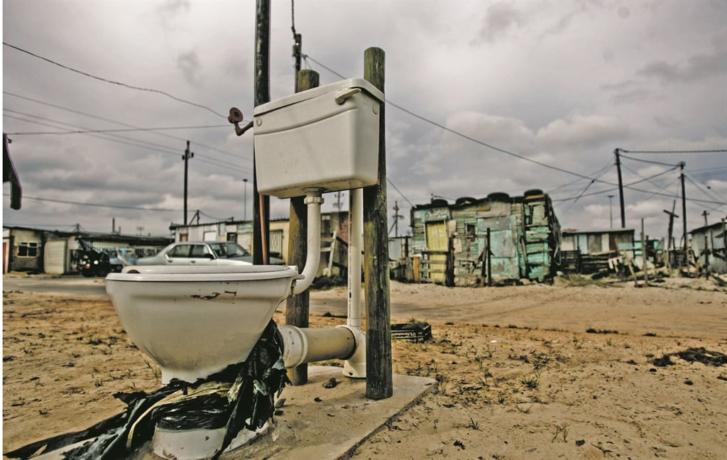 IN THE OPEN The DA-run Cape Town City Council erected unenclosed toilets such as this one in Makhaza informal settlement in Khayelitsha in 2009. It sparked outrage over lack of privacy and human dignity.  Picture: Jaco Marais 