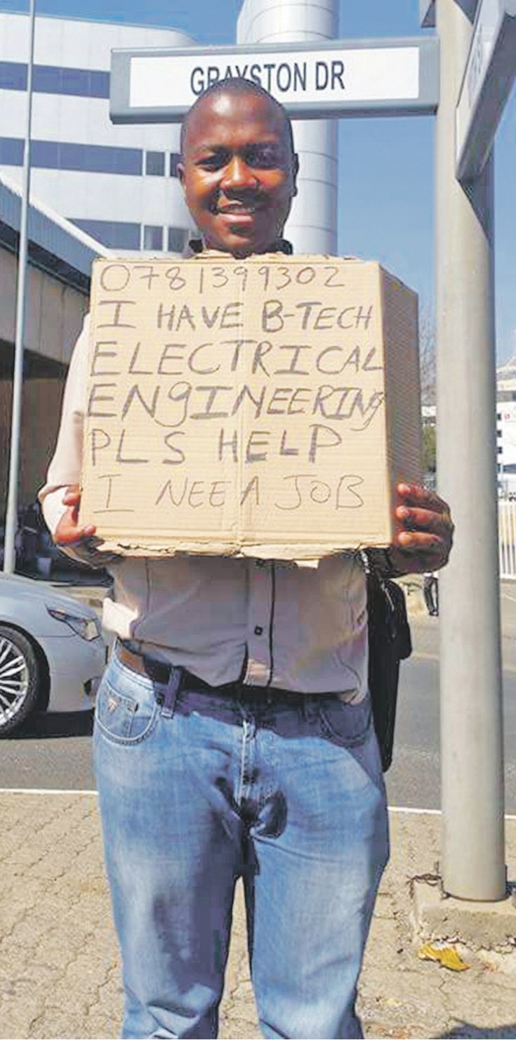 A graduate stands on a street corner begging for work. Picture: Facebook and Instagram 