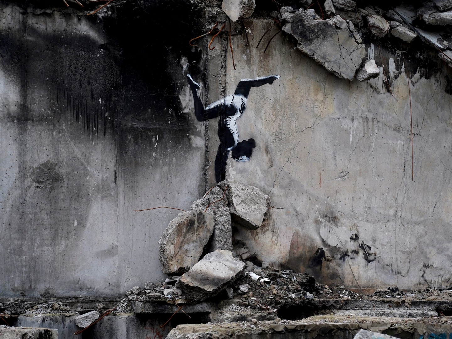 Banksy created a new mural in Ukraine depicting a gymnast on a building